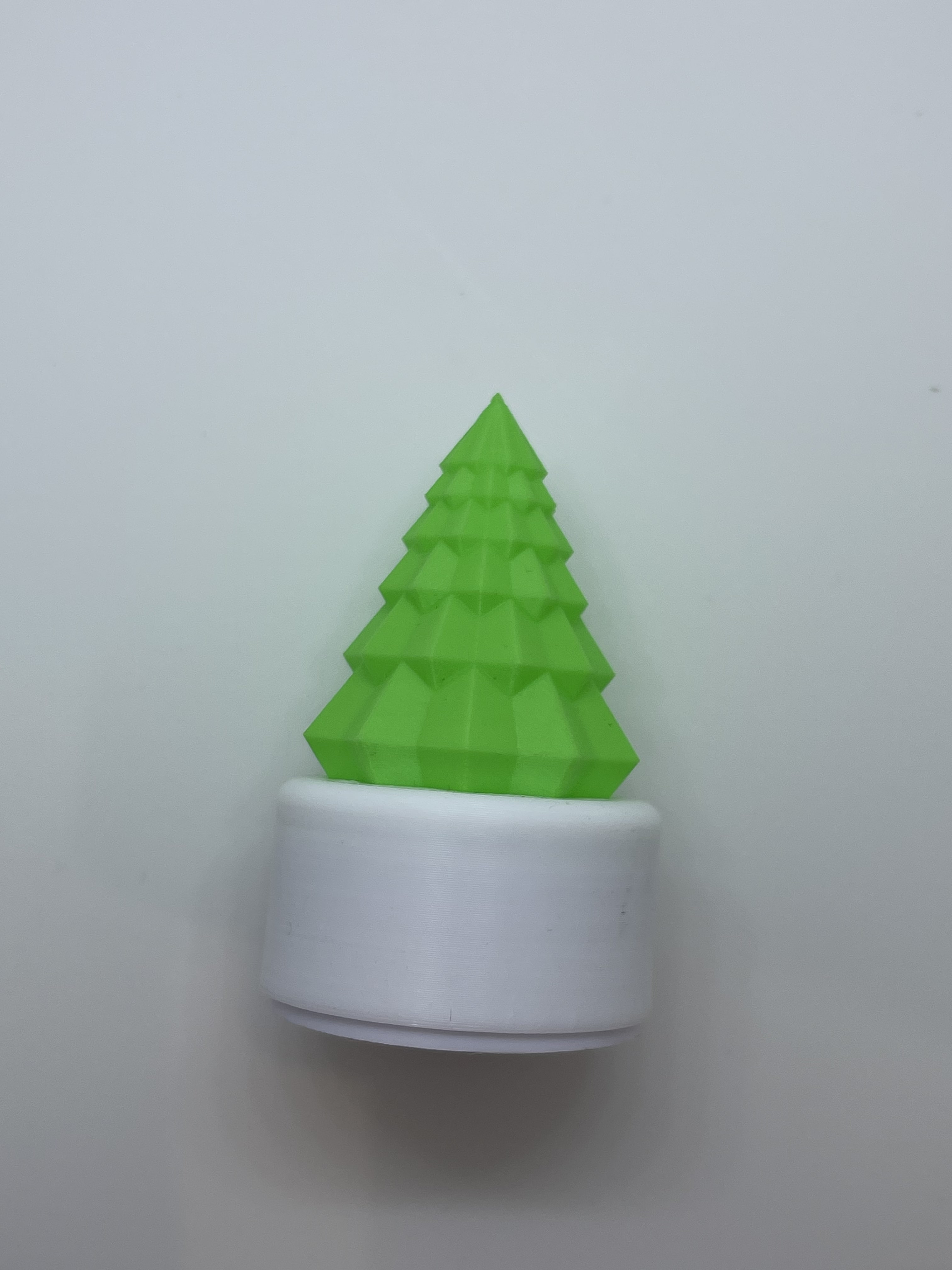 Christmas tree on white stand