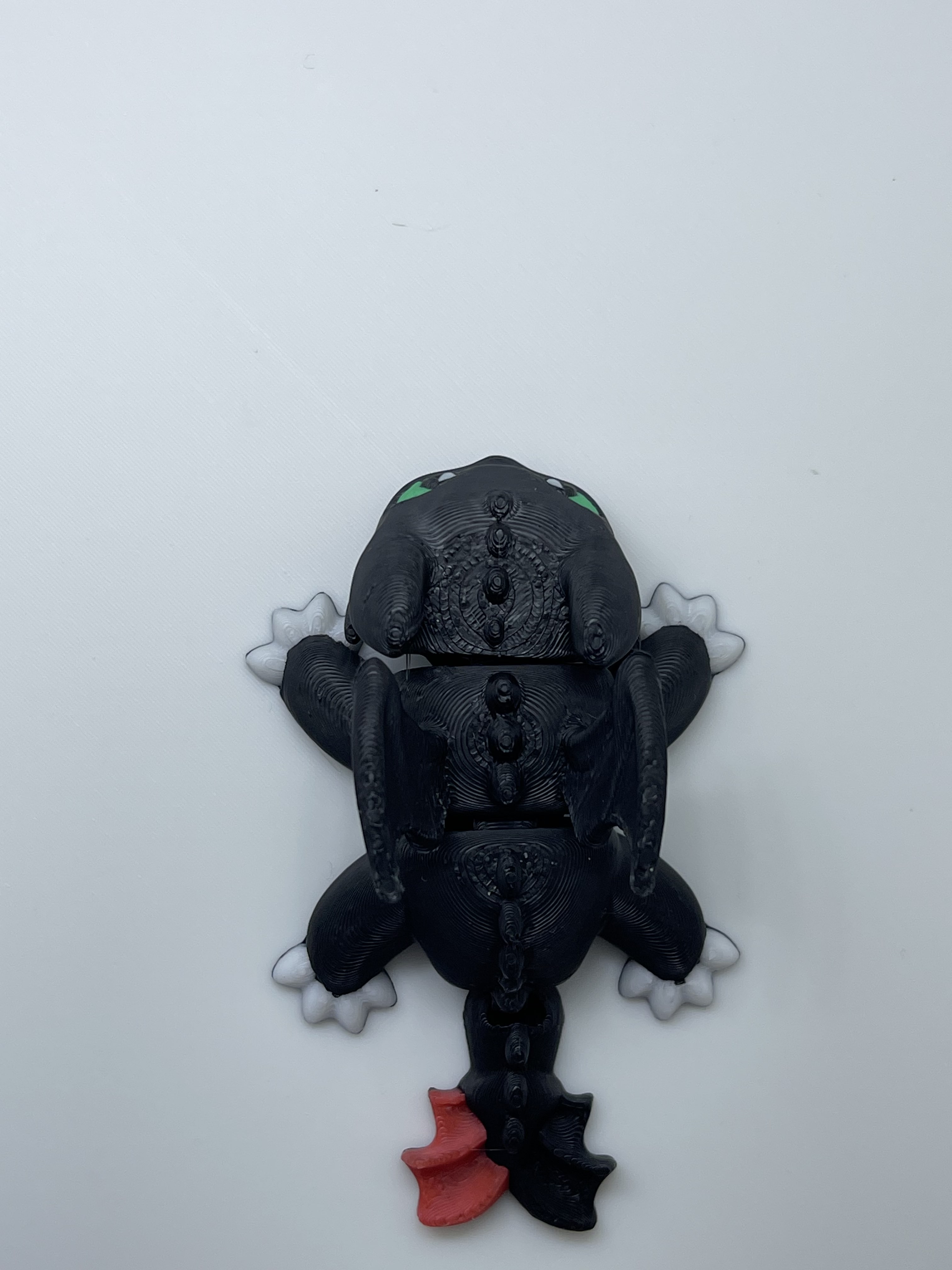 Toothless with movable joints and part of red tail