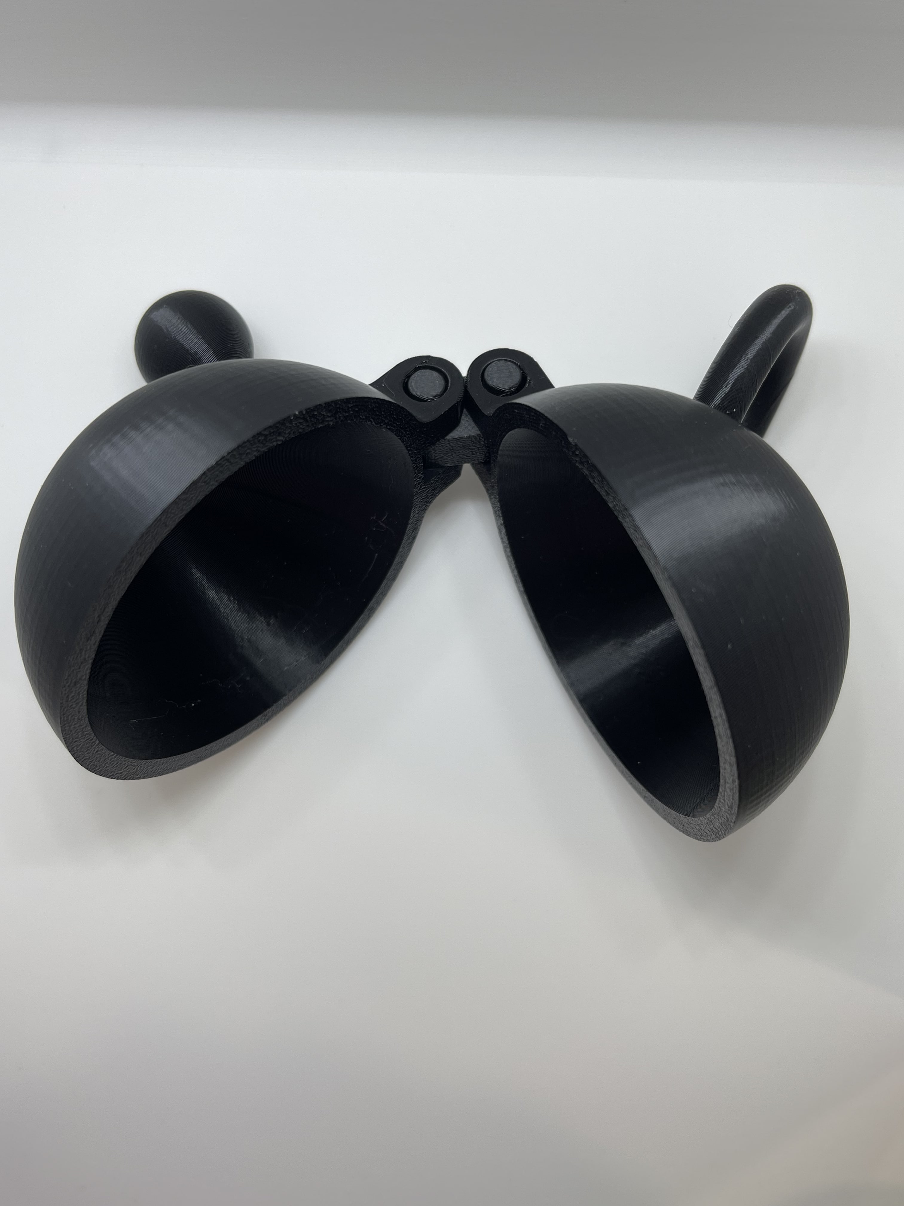 Black snowball mold with small handles